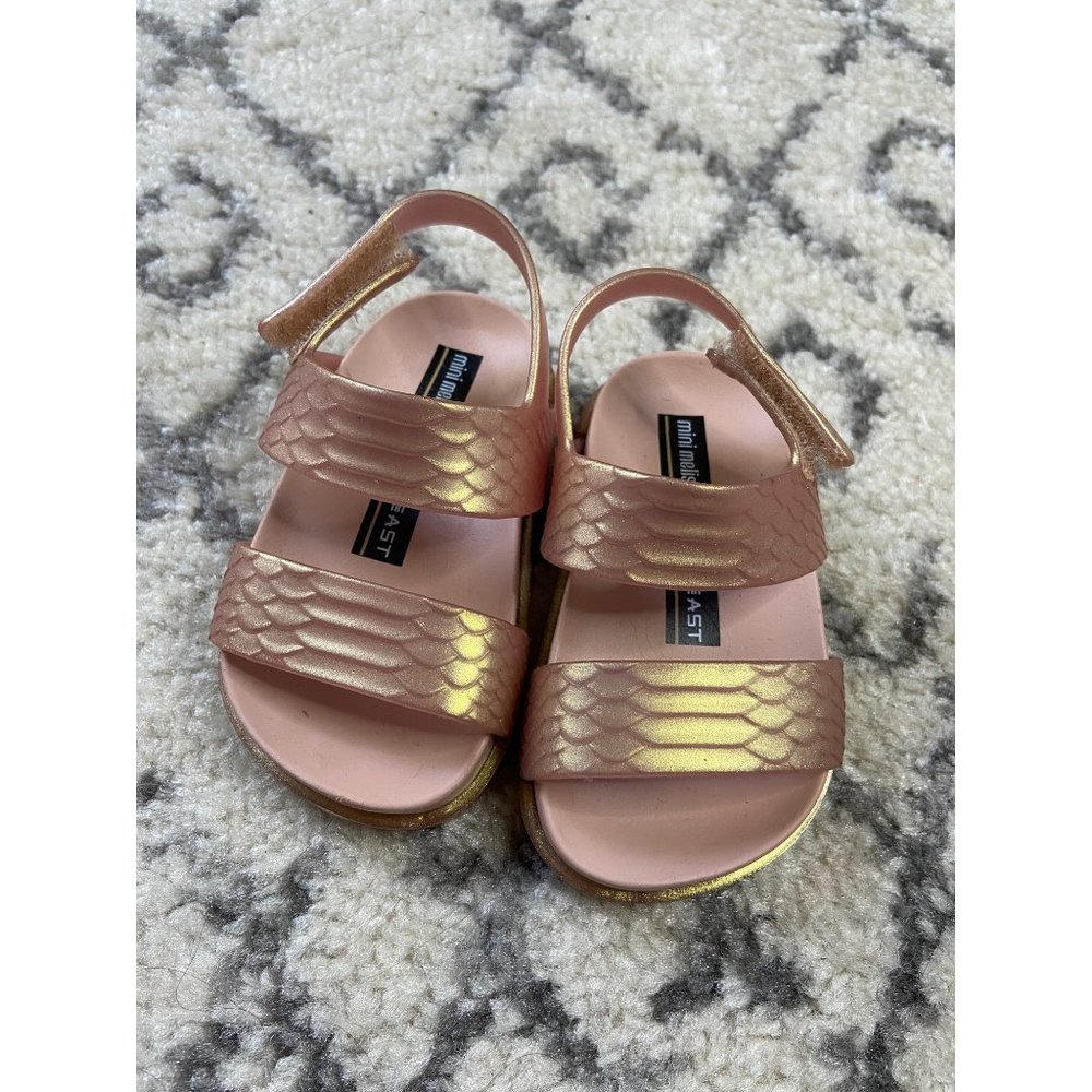 Mini Melissa + Baja East Girls Shimmery Pink sandals.